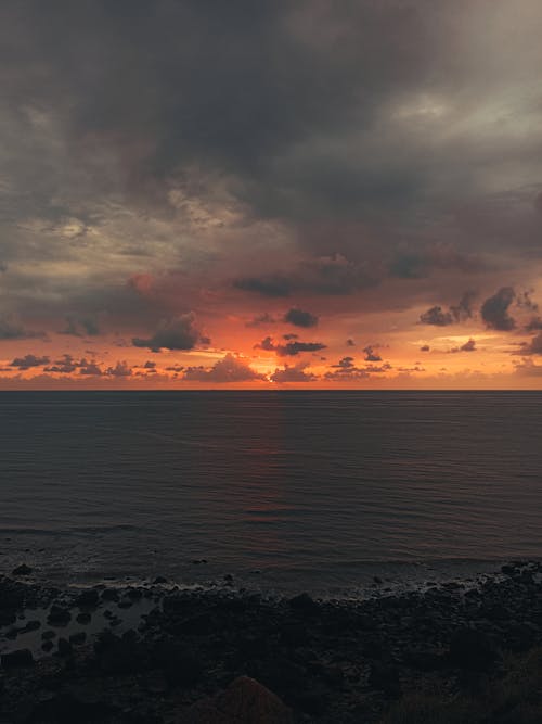 Gratis lagerfoto af gylden time, havudsigt, lodret skud