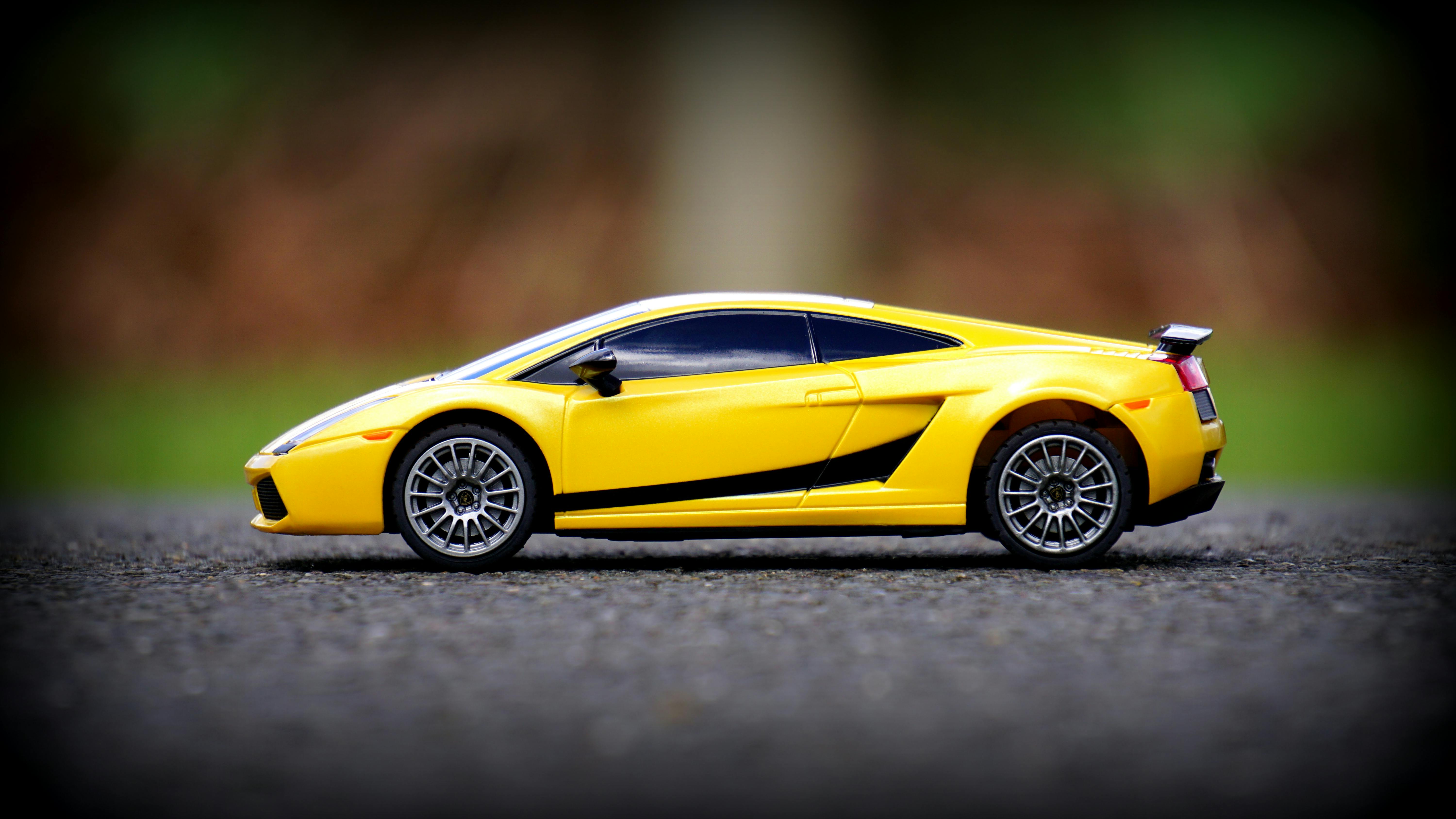 Yellow Diecast Toy Coupe · Free Stock Photo