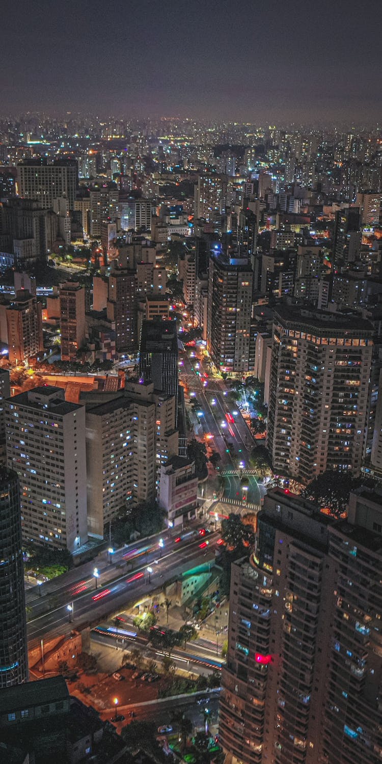 Traffic On Street In City At Night