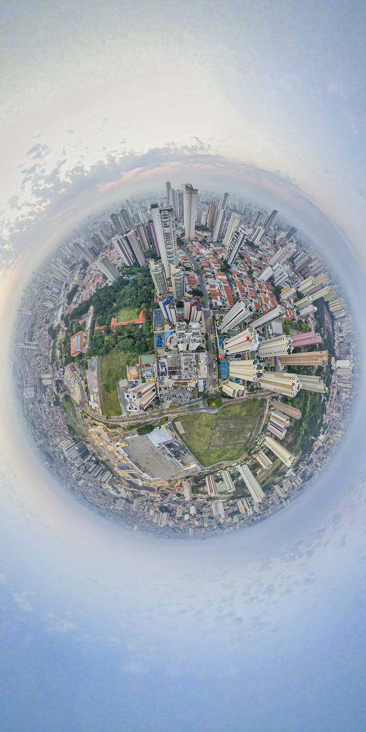 Earth As City With Skyscrapers On Globe