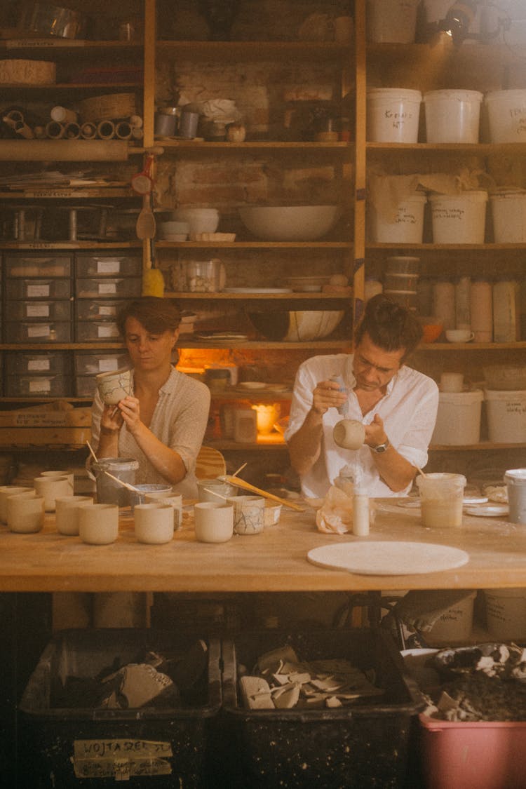 People Painting Bowls