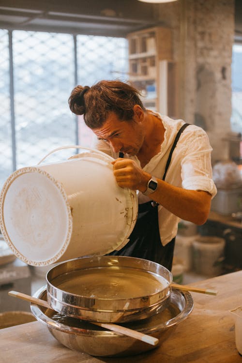 Craftsman making Clay Liquid 