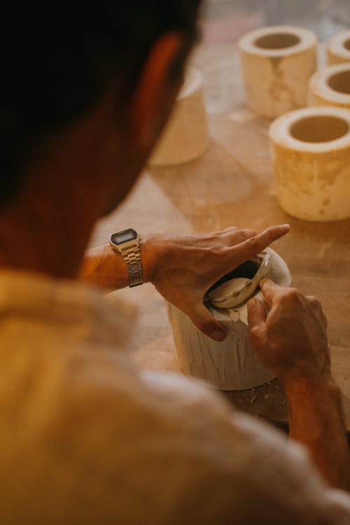 Craftsman working on an Earthenware Pot