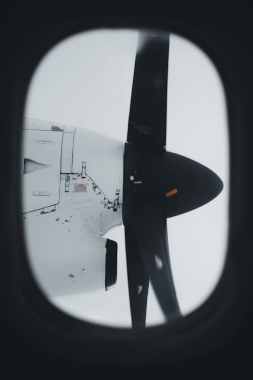 Aircraft Propellers through a Plane Window 