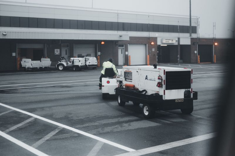 Tow operator providing a vehicle jump start