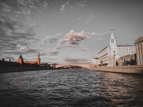 Free Stunning photograph of Kremlin and Moskva River under dramatic sunset skies in Moscow, Russia. Stock Photo