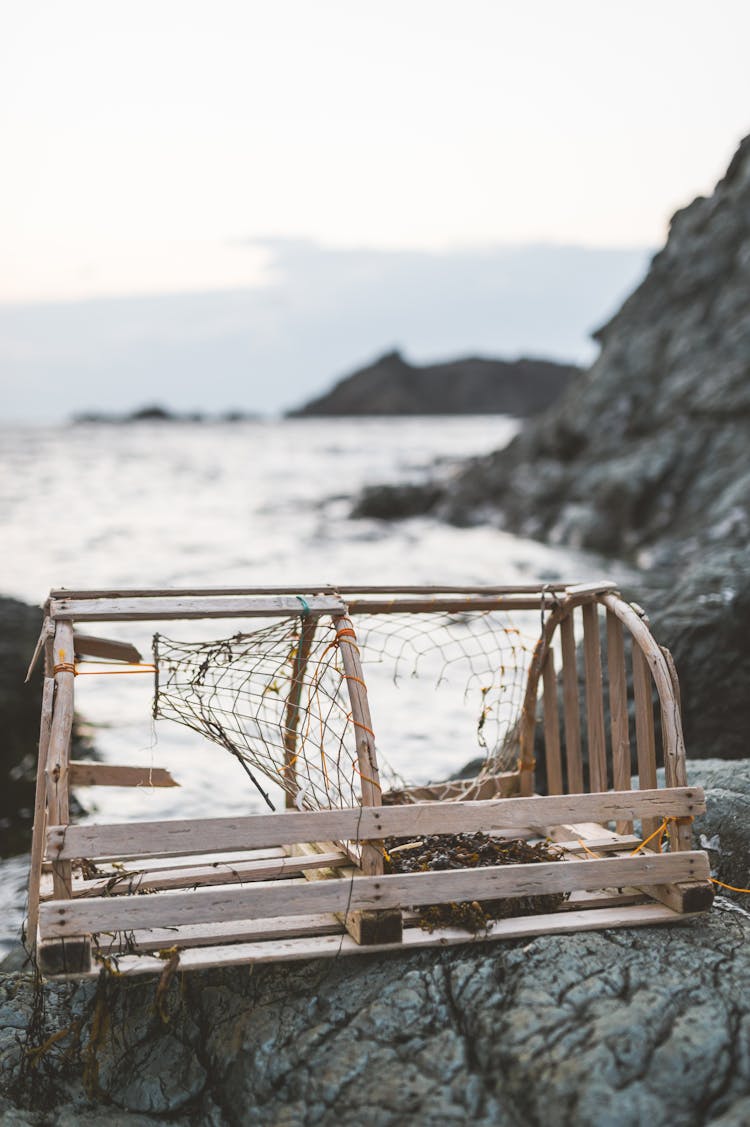 Close-up Photo Of Wooden Crab Cage 