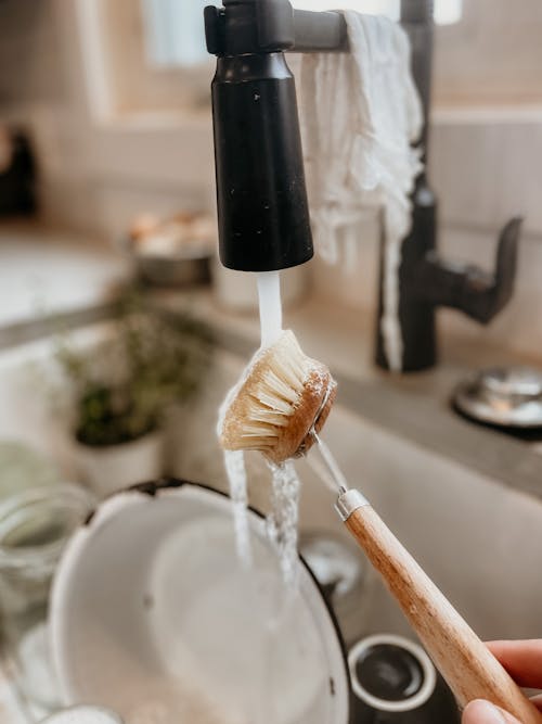 Clean Brush under Faucet