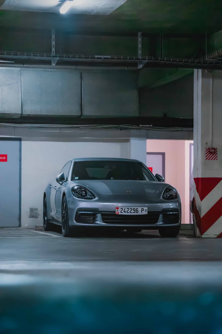 Silver Car On The Parking Garage