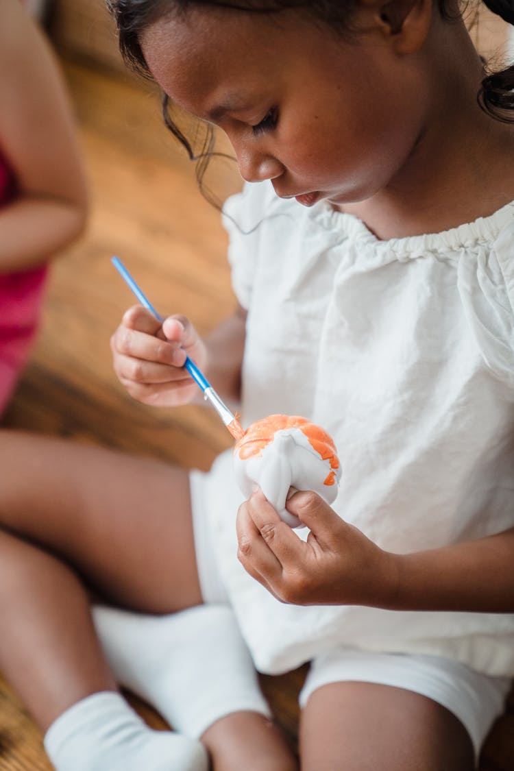 Close Up On Girl Painting Halloween Decoration