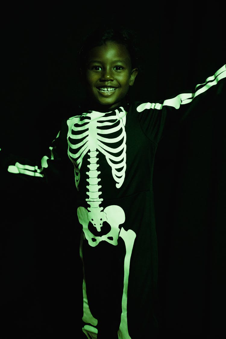 Smiling Girl In Skeleton Costume 