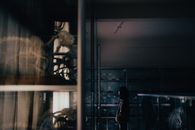 Woman Looking Around the Laboratory