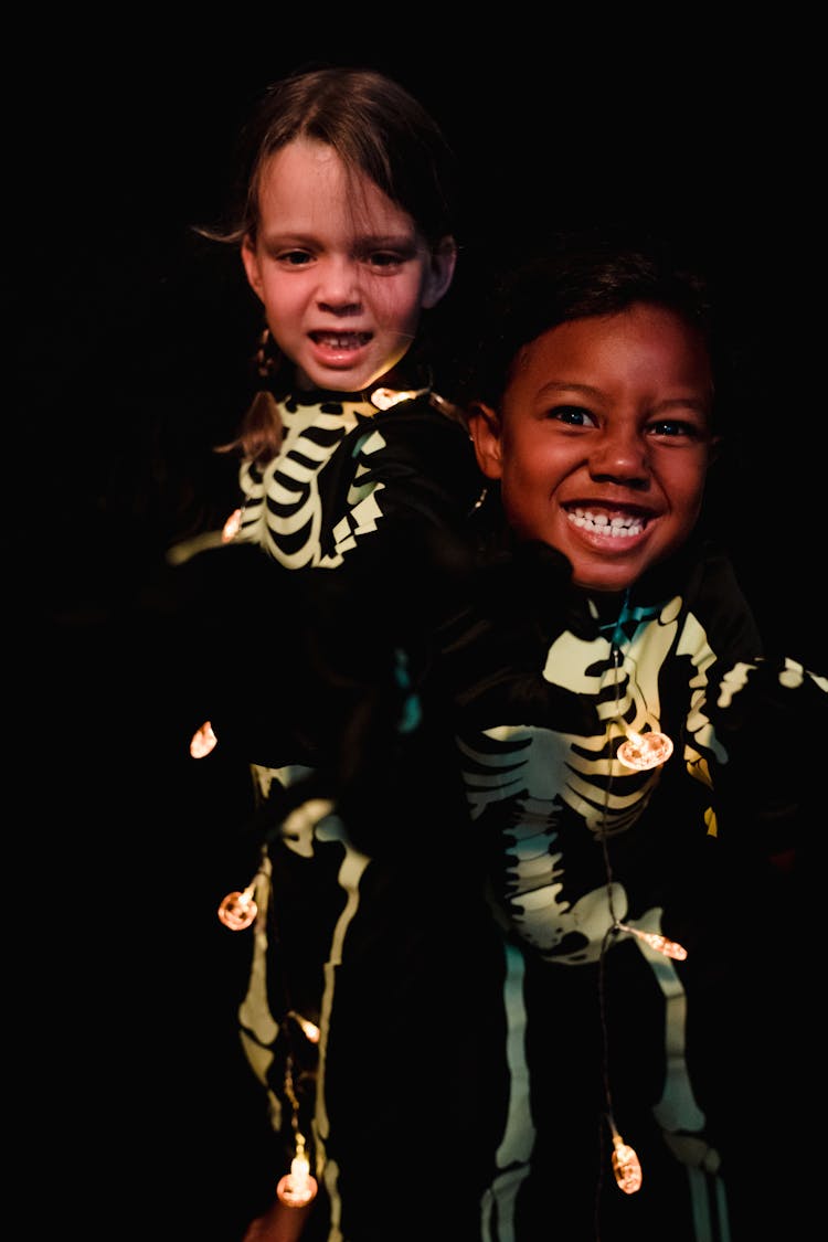 2 Children Dressed Up As Skeletons