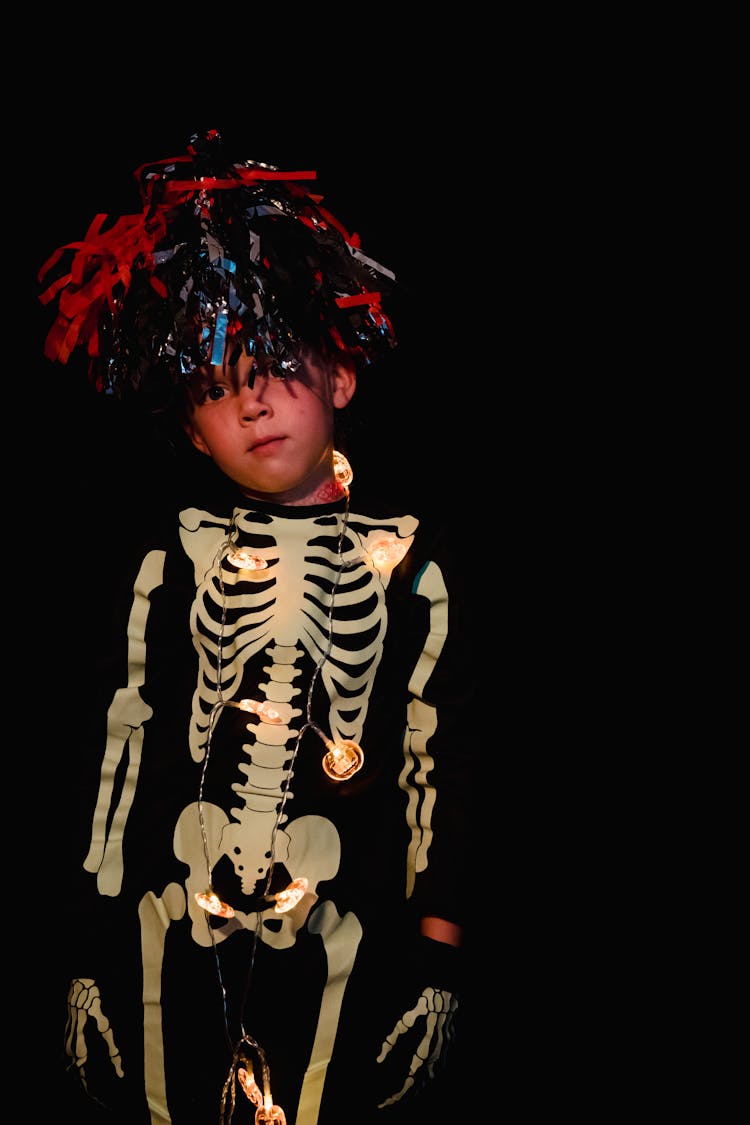 Boy Dressed Up As Skeleton With Fake Hair