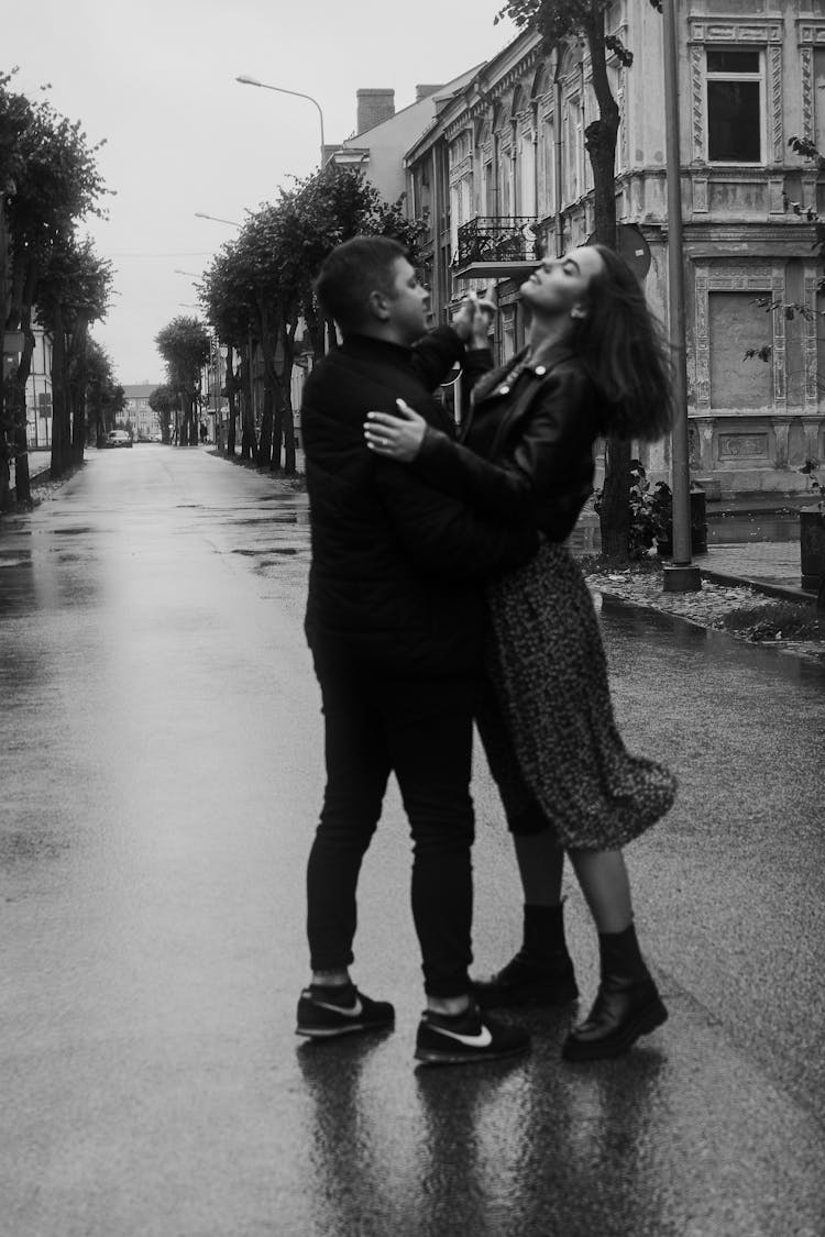 Monochrome Photo Of A Couple Dancing In The Street