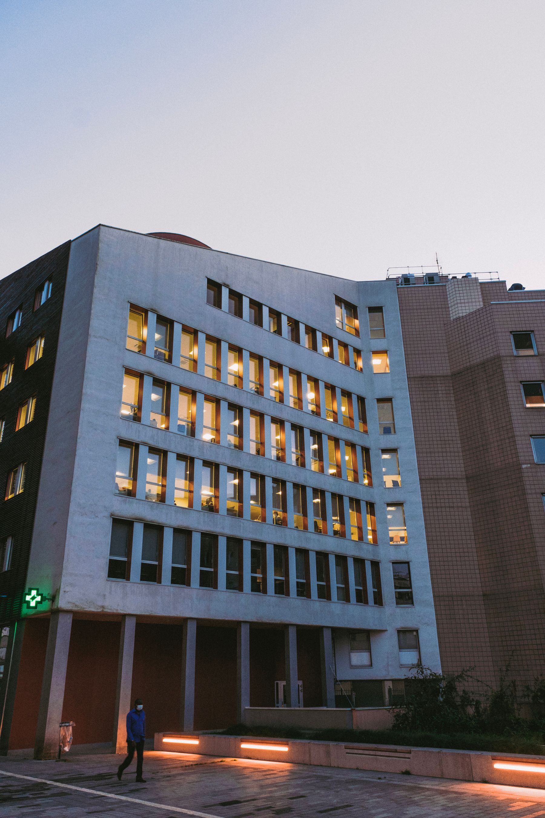 Operational hospital campus at dusk