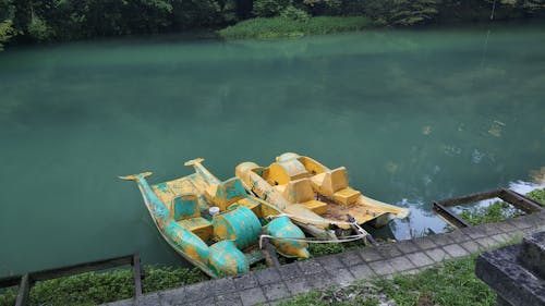 Free Yellow and Green Boats on Dock Stock Photo