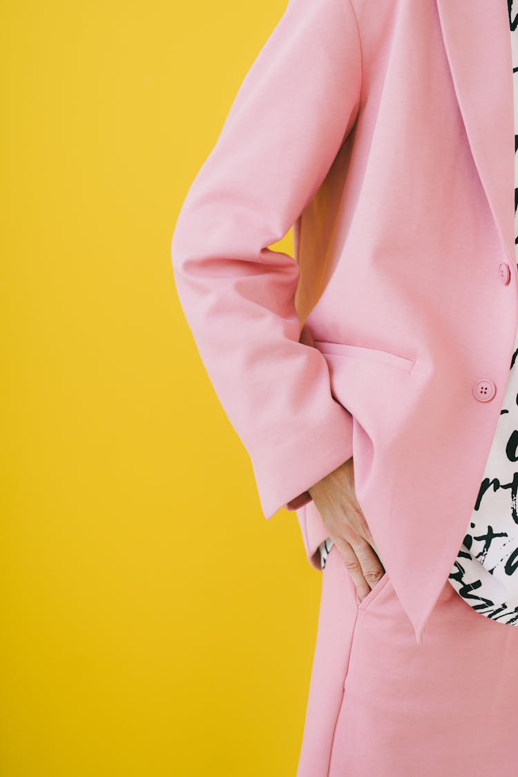 Midsection Photo Of Man In Pink Suit On Solid Yellow Background