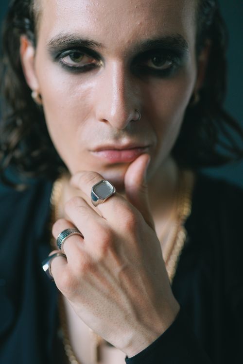 Free Close-up portrait of a fashionable adult with smoky eye makeup, showcasing elegance and style. Stock Photo