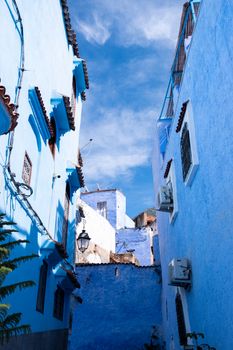 Explore the stunning blue streets of Chefchaouen, a striking Moroccan cityscape.