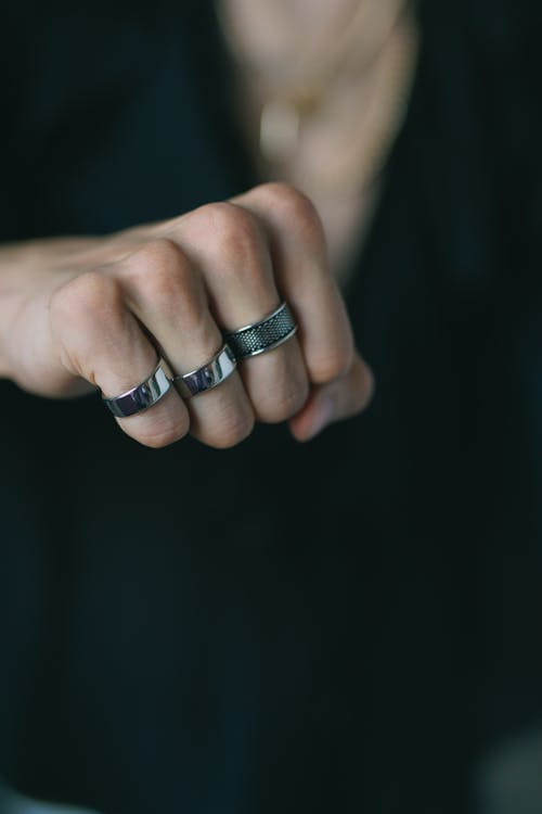 Clenched fist with rings 