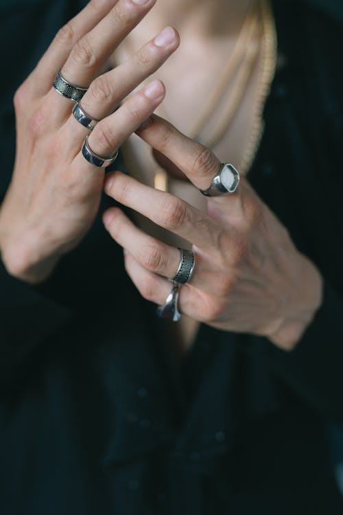 Close-up of man hands with rings 