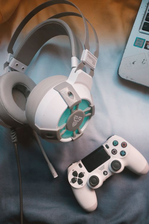 Headphones and a Game Controller · Free Stock Photo