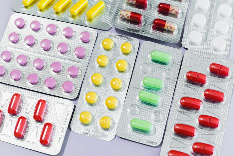 Assorted Colorful Pills In Blister Packaging