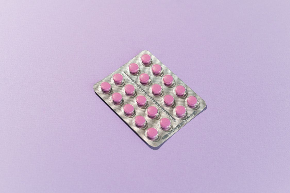 Pink Medication Pink Medicine Tablets on White Surface · Free Stock Photo