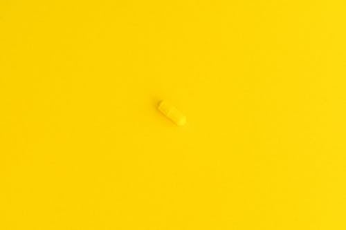 Fotos de stock gratuitas de amarillo, brillante, cápsula