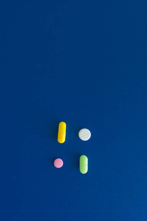 Foto stok gratis kapsul, obat, permukaan biru