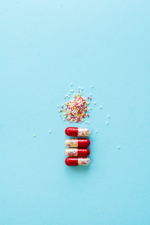 Red Capsules in Blue Surface