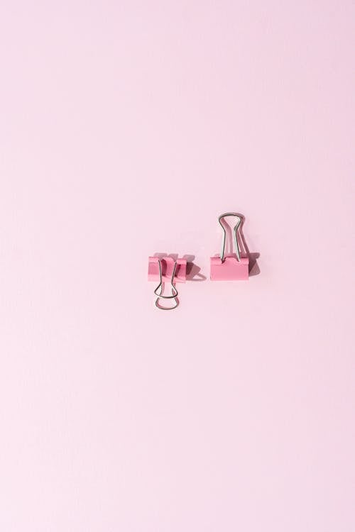 Close Up Photo of Binder Clips