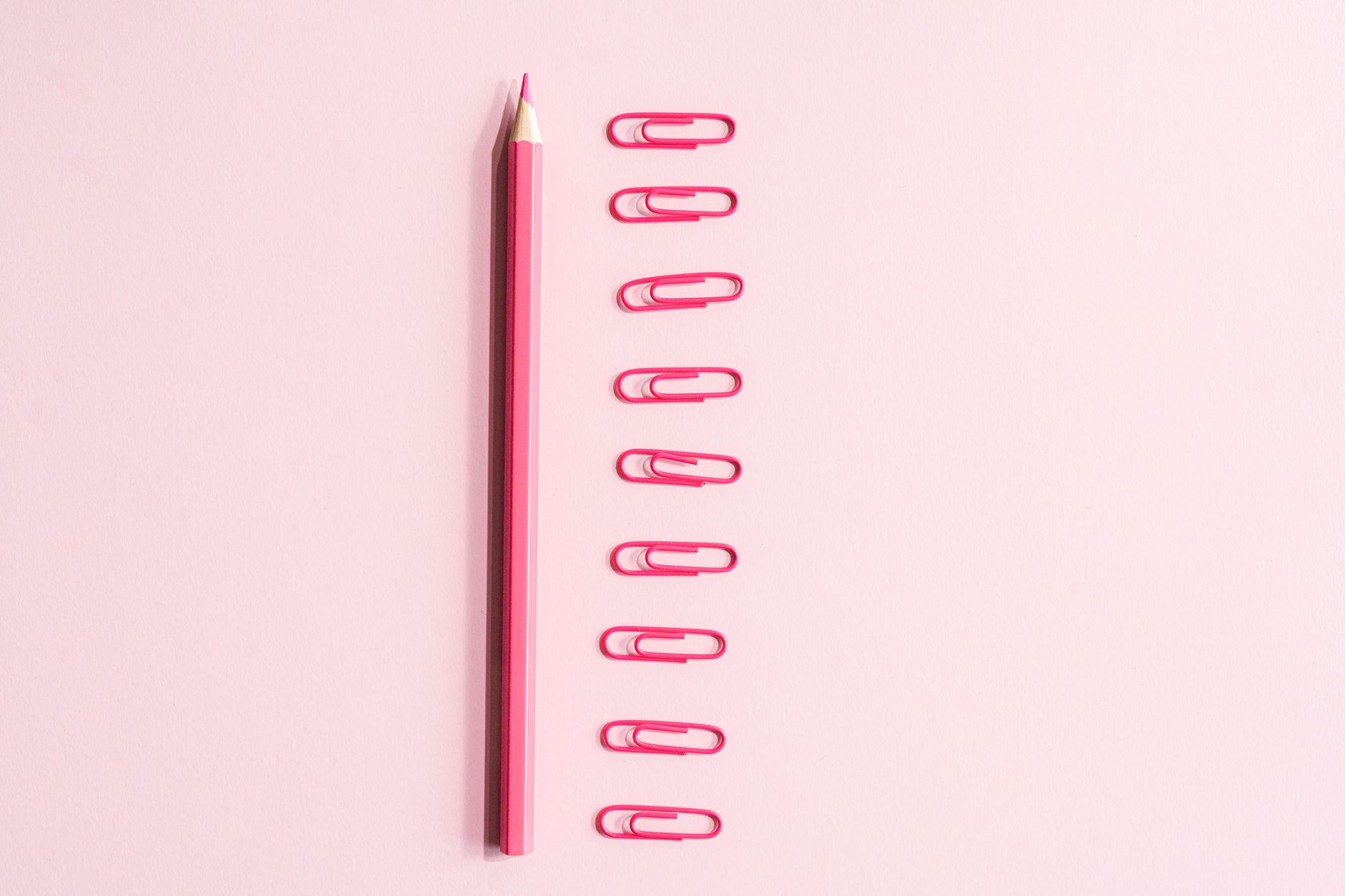 Pink Pencil Near Paper Clips