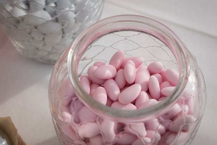 Pink Candies In A Glass Jar