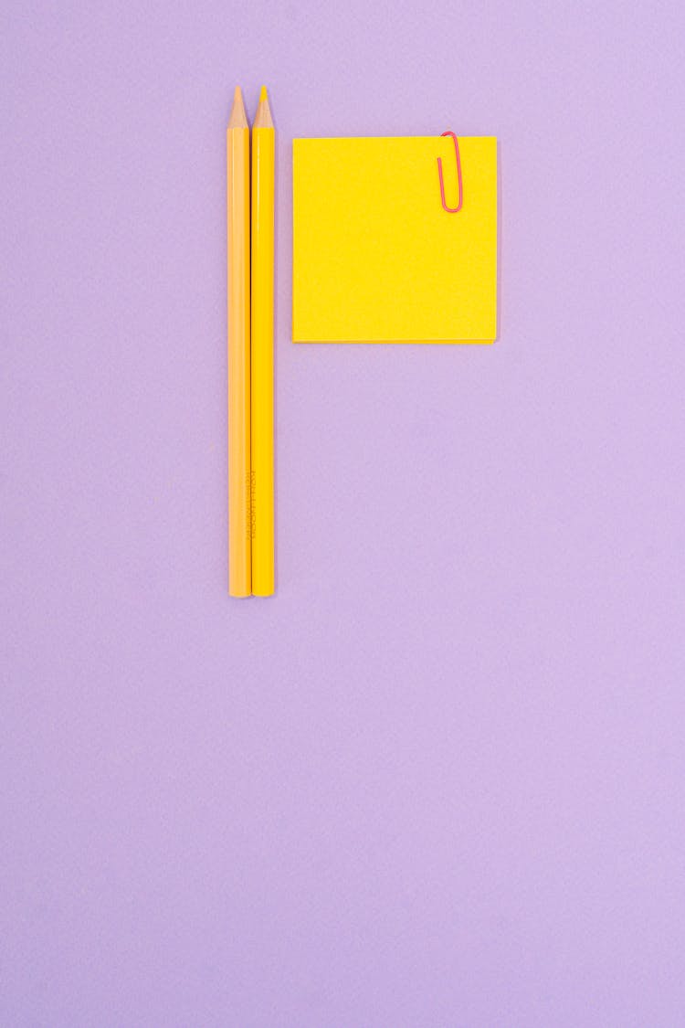 Yellow Coloring Pencils And Sticky Notes