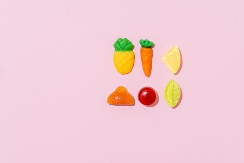 Close up of Candies on a Pink Background