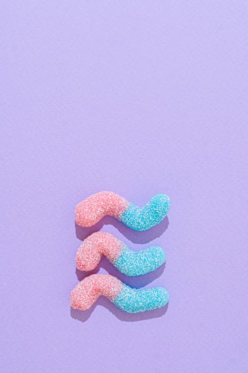 Jelly Worms against a Purple Background 