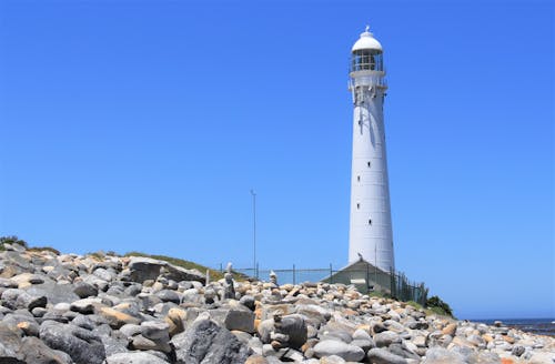 Free White Lighthouse Under Blue Sky Stock Photo