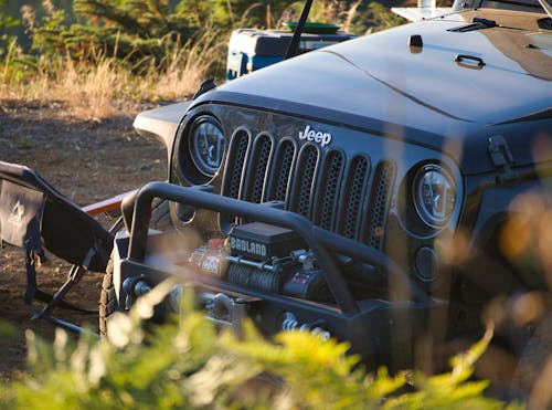 A Black Jeep on a Dirt Road