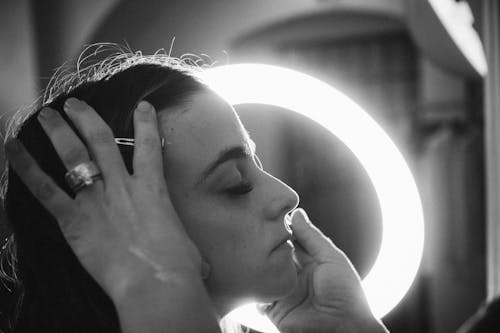 Free Grayscale Photo of a Woman Doing Make-Up Stock Photo