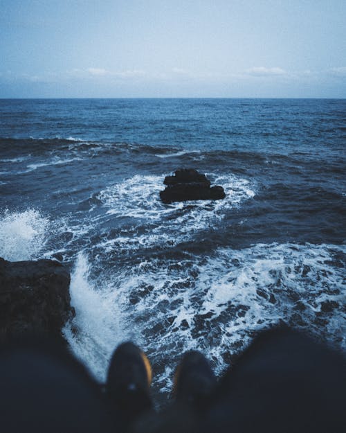 Black Rock Formation on Sea