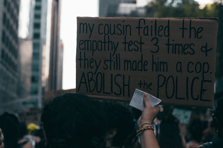 Text On Cardboard At Protest