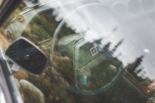 Бесплатное стоковое фото с автомобиль, окно, отражение