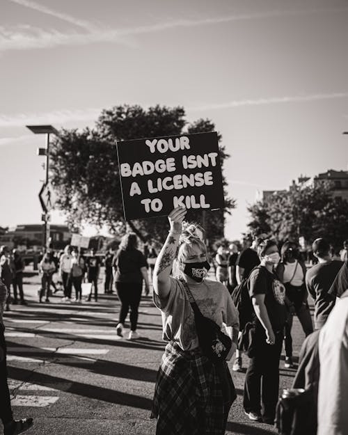Free Black and white photo of police brutality protest Stock Photo