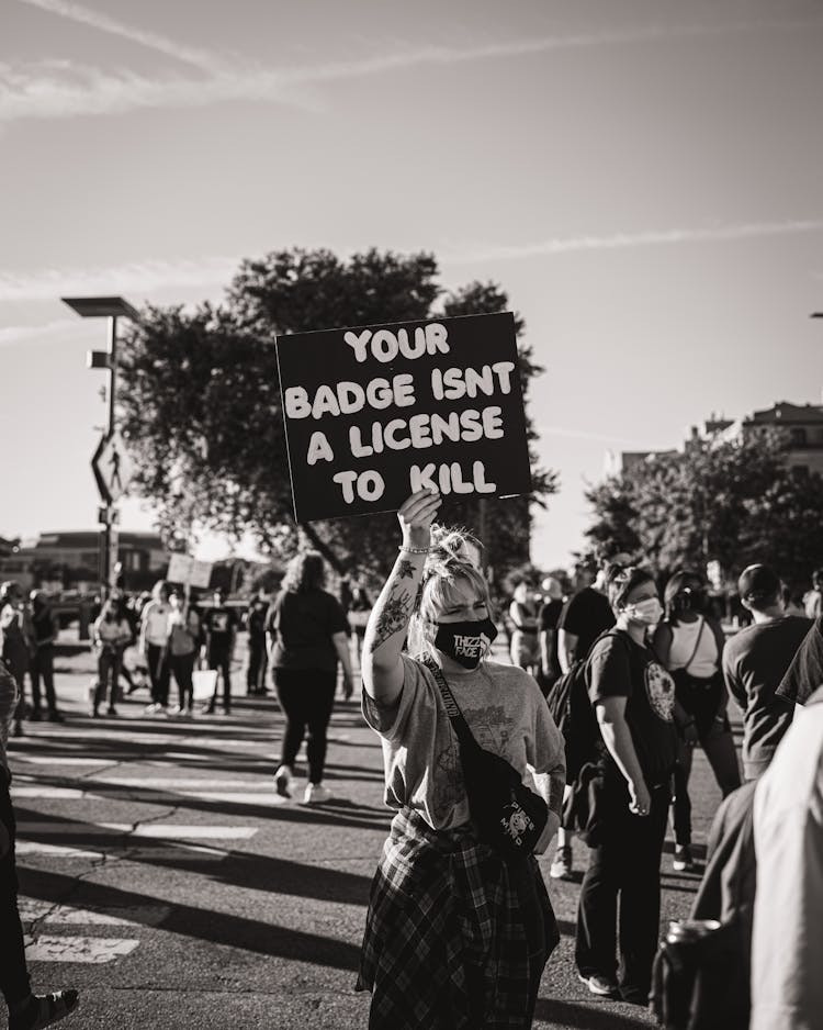 Black And White Photo Of Police Brutality Protest