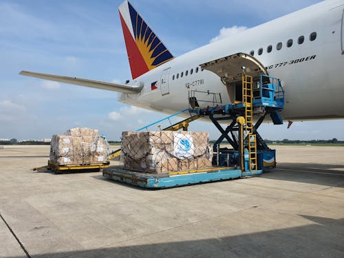 Boxes Being Loaded onto an Airplane 