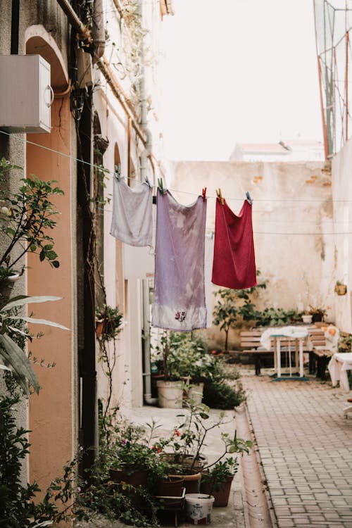 Laundry on clothesline outside house