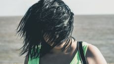 Woman Covered Her Face With Hair