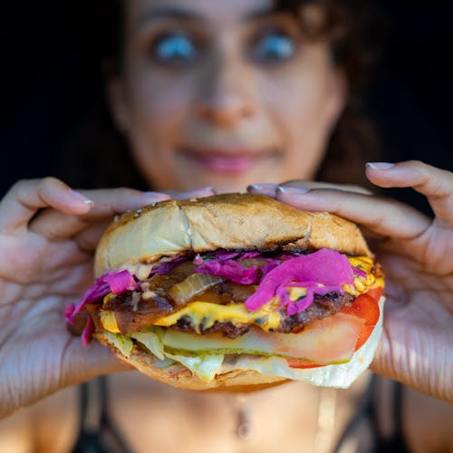 Free stock photo of attractive woman, beef burger, burger